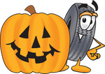 0025-0803-0310-0053_clip_art_graphic_of_a_tire_character_with_a_carved_halloween_pumpkin.jpg