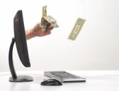 9366474-hand-sticking-out-of-computer-monitor.jpg