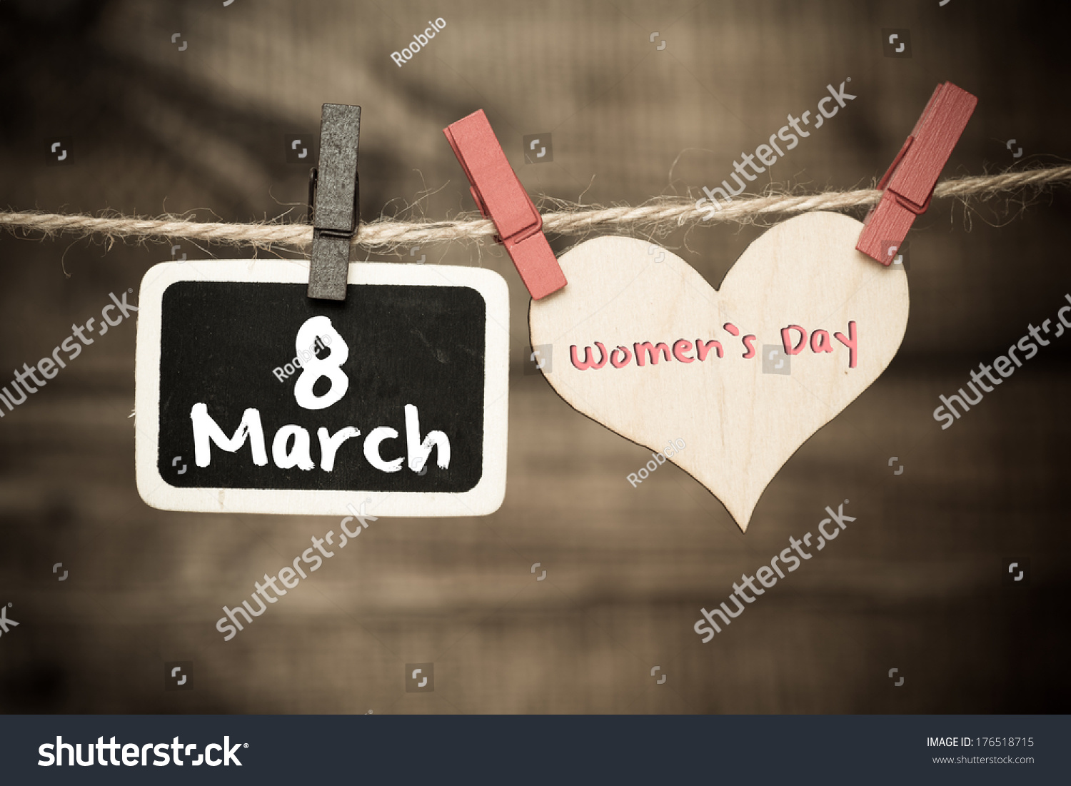 appy-women-s-day-text-calligraphy-and-typography-background-with-on-blackboard-on-rope-176518715.jpg