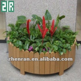 Beautiful_wood_plastic_decking_flower_beds.jpg