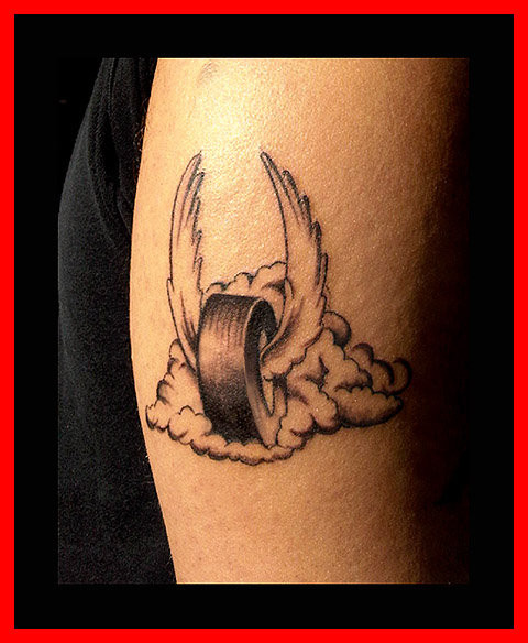 Burnout_Tire_Tattoo_by_dadenko.jpg