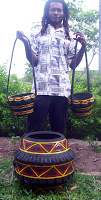 Chris+Dally+shows+some+of+his+pots.jpg