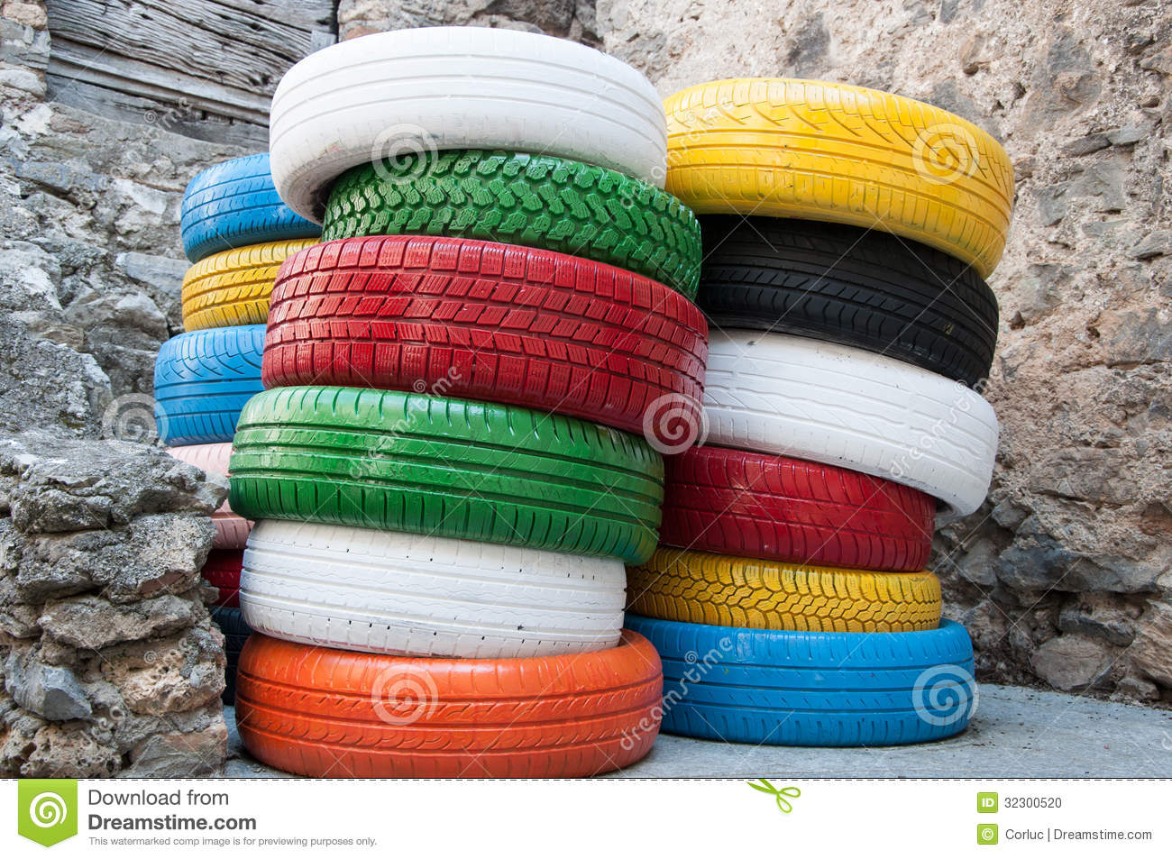 colored-tyres-some-old-standing-outside-workshop-32300520.jpg