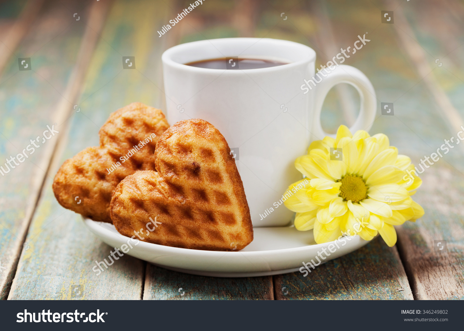 fle-biscuits-in-shape-of-heart-with-cup-of-coffee-and-flower-on-vintage-background-for-346249802.jpg