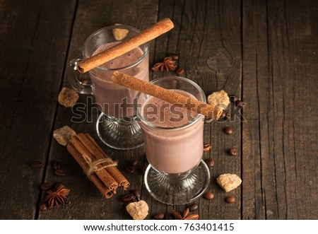 hocolate-coffee-milk-banana-shake-on-wooden-background-smoothie-with-cookies-milkshake-763401415.jpg