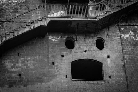 low-angle-view-of-face-on-exterior-of-building-royalty-free-image-1571137431.jpg