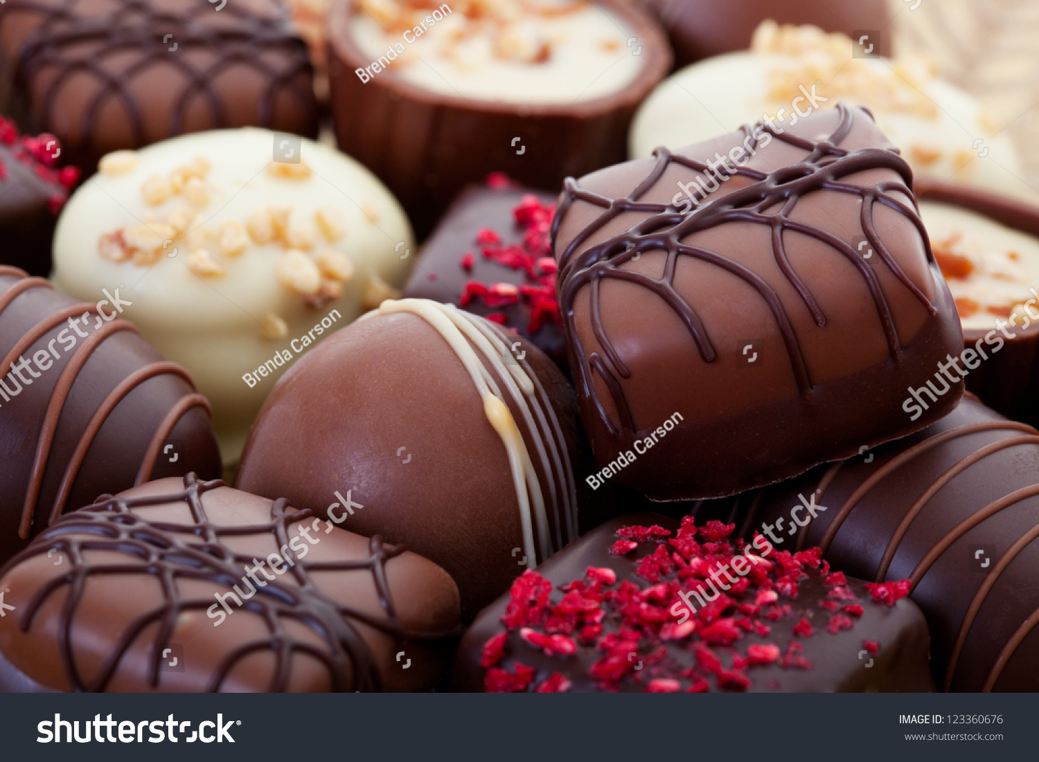 stock-photo-an-assortment-of-fine-chocolates-in-white-dark-and-milk-chocolate-123360676.jpg