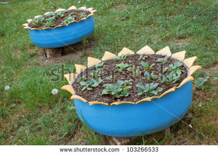 stock-photo-two-beds-are-made-of-old-tires-103266533.jpg