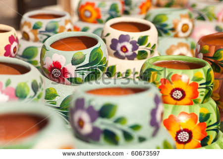 stock-photo-variety-of-colorfully-painted-ceramic-pots-in-an-outdoor-shopping-market-60673597.jpg