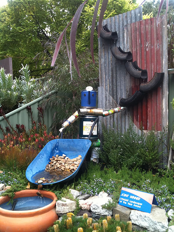 WATER+FEATURE+MADE+FROM+RECYCLED+MATERIALS+OLD+CANS+TYRES+MIFGS+2012.JPG