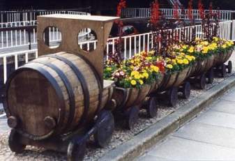 whiskey-barrel-train-garden-planter.jpg
